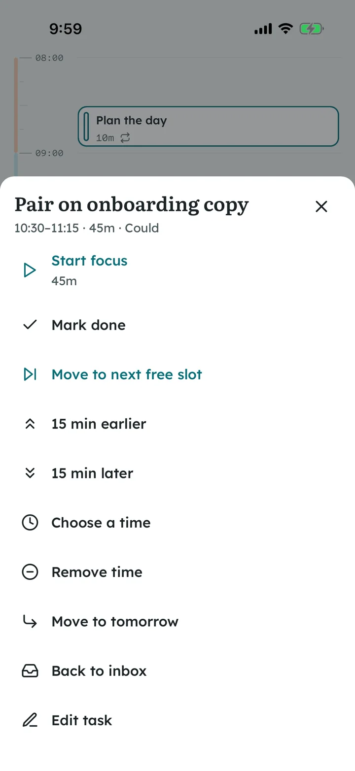 Block actions on iOS for an overlapping task: start focus, mark done, move to the next free slot, 15 minutes earlier or later, choose a time, tomorrow, back to inbox