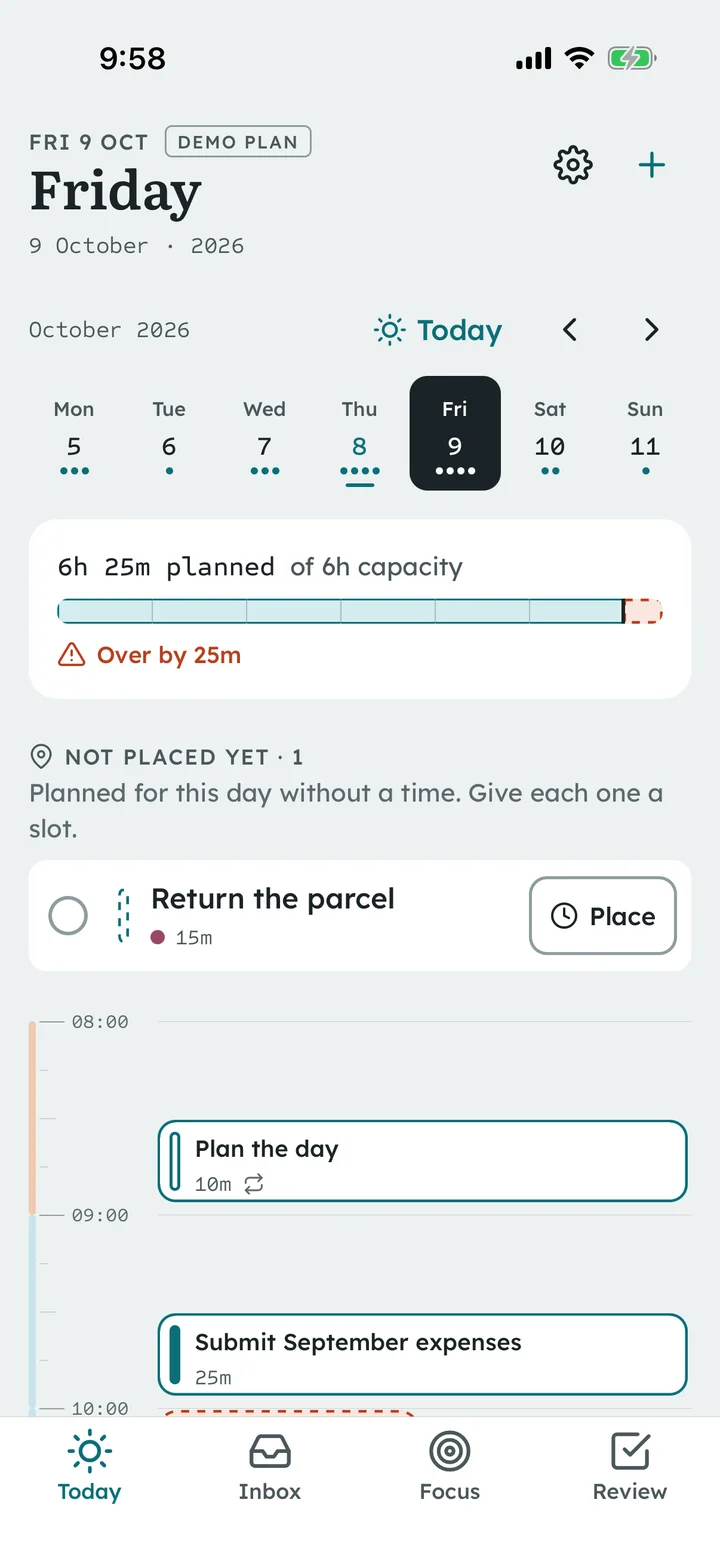 Taskavyn on the iOS Simulator: a day with the week strip, the capacity ruler showing the plan is over capacity, a task not placed yet and the start of the time ruler